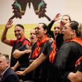 Representatives of Mākereti’s tribe, Tūhourangi, performing a traditional Māori chant to welcome Mākereti’s spirit and her family during the Māori remembrance ceremony held at the Natural History Museum. 
