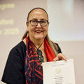 June Northcroft Grant holding Mākereti’s degree certificate.