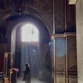 A woman praying in a church 